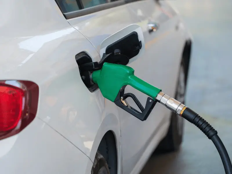 filling up car at gas station