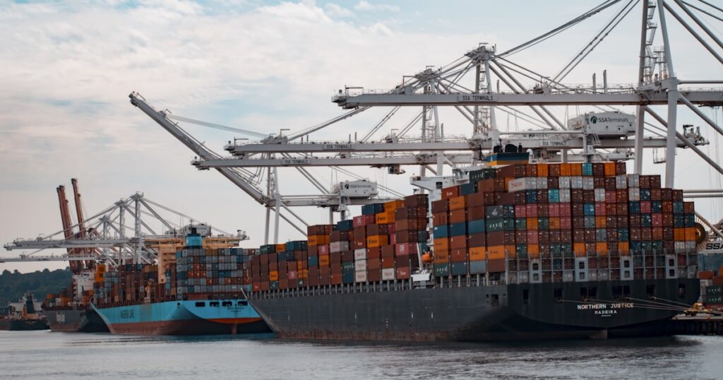 Shipping containers being loaded for Hawaii - household goods shipping guide 2026