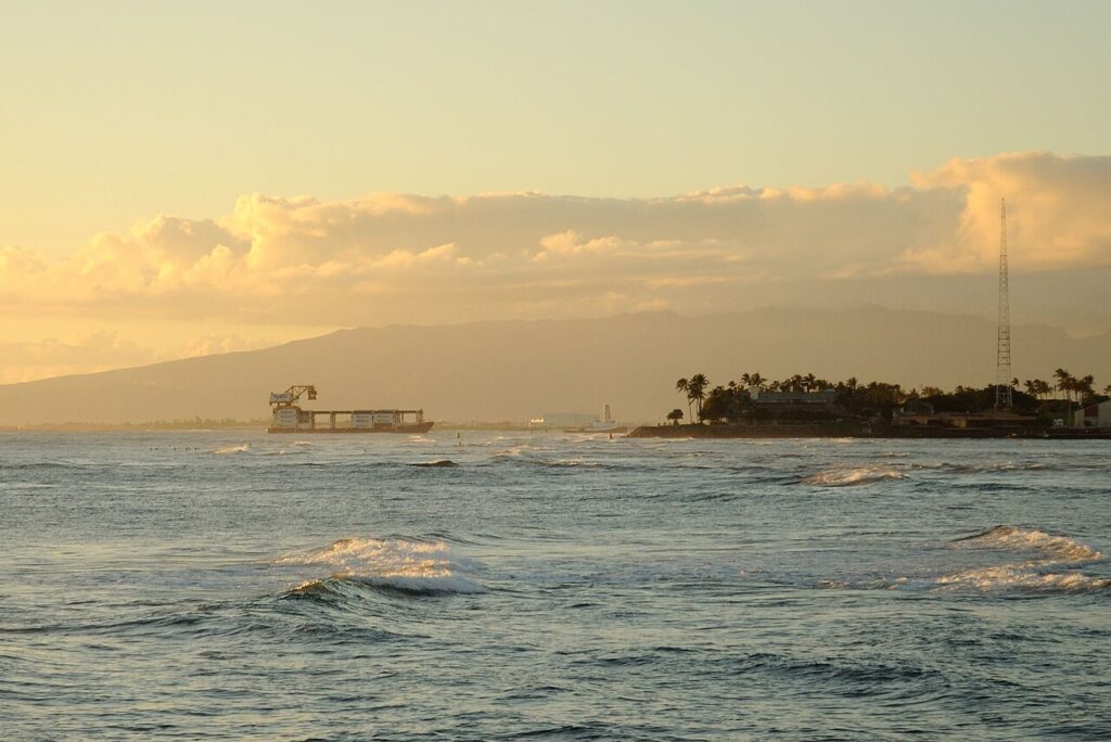 Container ship pulling into Honolulu Harbor, Hawaii