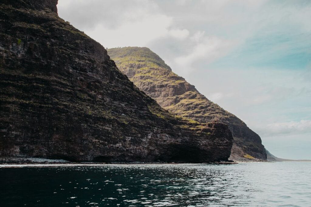 Poipu Shipwreck Cliff Overlook: Kauai Southshore Photo Vantage — photo by @trenthaaland on Unsplash